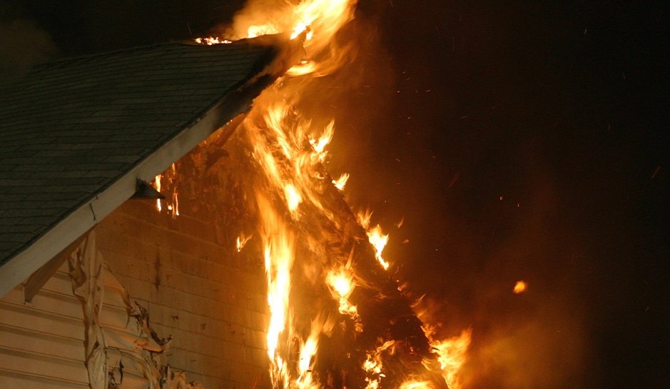 Rooftop of home on fire