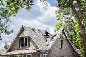 Home roof affected by fire damage